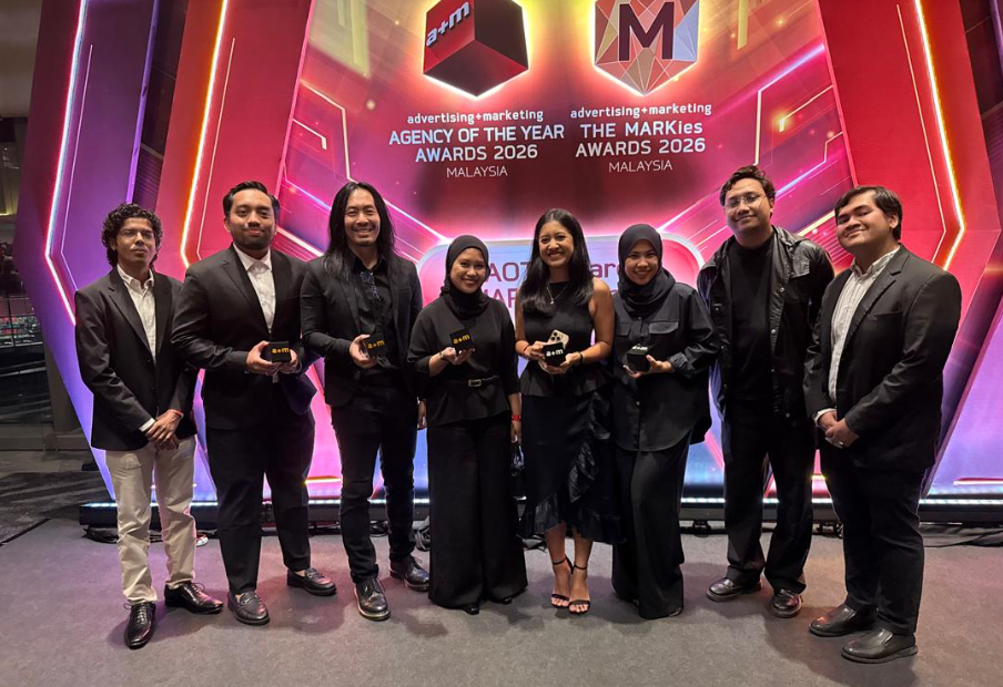 A group of people from Astro SHAW receiving awards